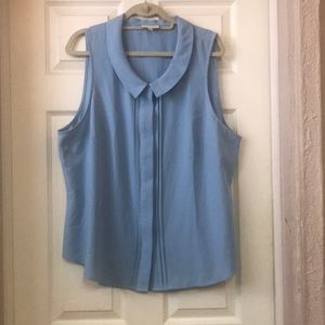 Baby blue Peter Pan collar sleeveless blouse.